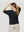 Poleron Mujer Montserrat Relaxed Cuello En V Manga Caída Negro Lineatre