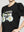 Polera Mujer Ofelia Manga Corta Con Estampado De Margaritas Negra Lineatre