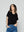 Polera Mujer Ottavia Cuello Redondo Brillante Negra Lineatre