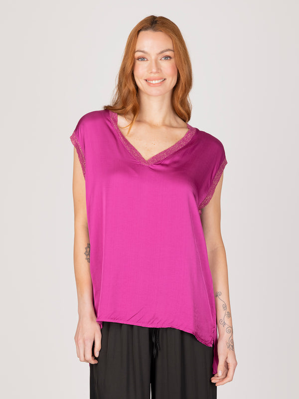 Polera fucsia lineatre